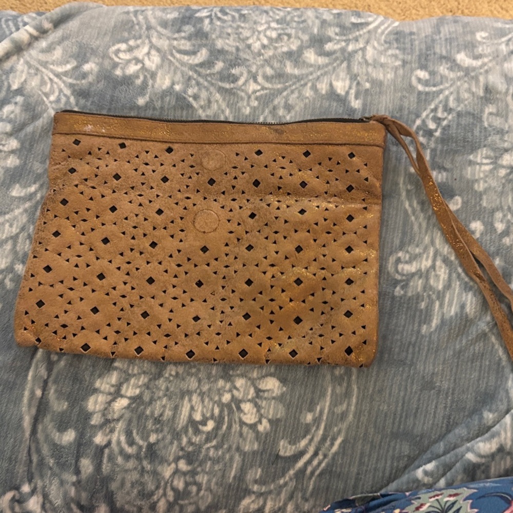 Cleobella Distressed Brown Perforated Clutch.  Tan suede with flecks of gold.